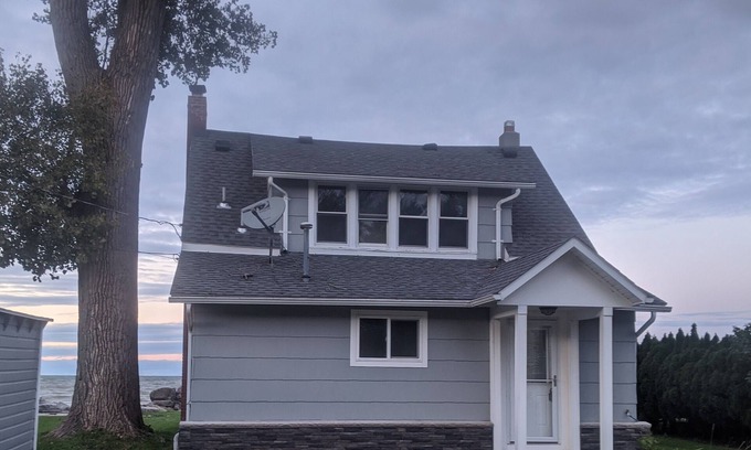 North Greece House | Adorable Cape Cod on Lake Ontario Waterfront