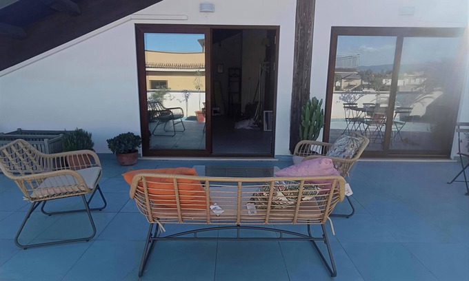Locri Apartment | Air-conditioned attic room with large terrace