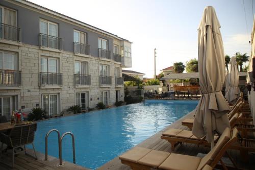Tokoglu Hotel | Alaçatı Çınar Otel
