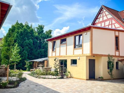 Hofheim in Unterfranken House | Amber Ferienhain - Ferienhaus 'Kirsche' mit verwunschenem Garten & privater Sauna