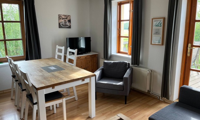 Stove Apartment | Apartment 4 with 2 bedrooms (2-5 pers.) on the upper floor - Villa Seeheim vacation property directly on the waterfront
