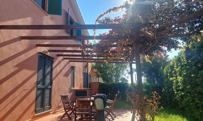 Cavo Apartment | Apartment Cala Azzurra - with large garden and a stone's throw from the sea