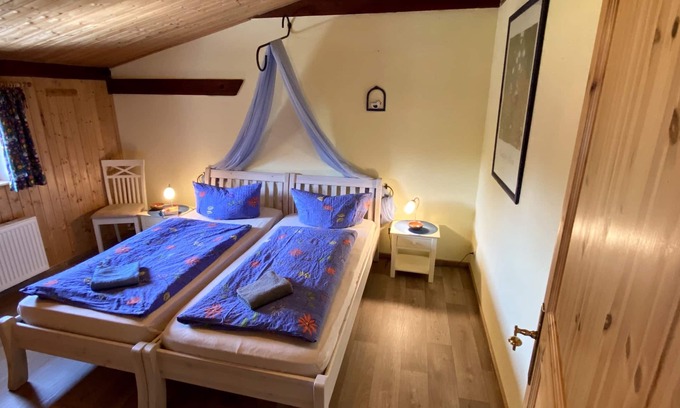 Henriettenhof Apartment | Apartment "Heuboden" cozy - wood-burning stove - great view of the countryside, sauna