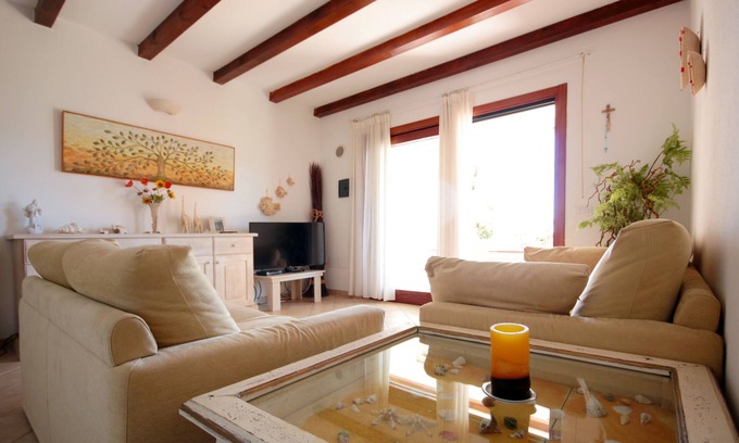 Porto San Paolo Apartment | Apartment in villa with splendid sea and garden view