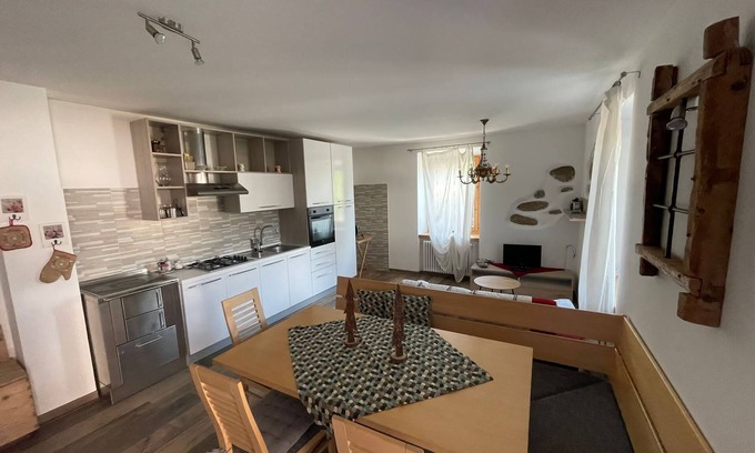 Revo Apartment | Apartment in the mountains, view of the Maddalene chain -Trentino-Alto Adige CIN