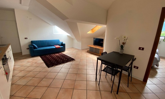 Feltre Apartment | Apartment 'La Mansarda' with Mountain View, Shared Garden and Air Conditioning