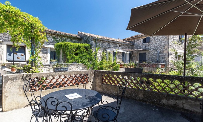 Orgnac-l'Aven Apartment | Apartment 'Micocoulier De La Maréchale' with Mountain View, Shared Pool and Wi-Fi
