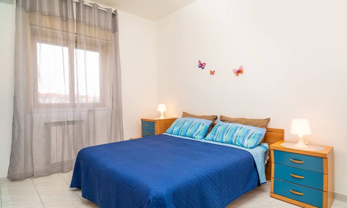 San Giorgio-Librino-San Giuseppe la Rena-Zia Lisa-Villaggio Sant'Agata Apartment | Apartment 'Nigido Holiday Houses Simona' with Sea View, Wi-Fi and Air Conditioning