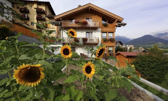Carano Apartment | Apartment 'Villa Prafiori Giglio' with Mountain View, Shared Garden, Balcony & Wi-Fi