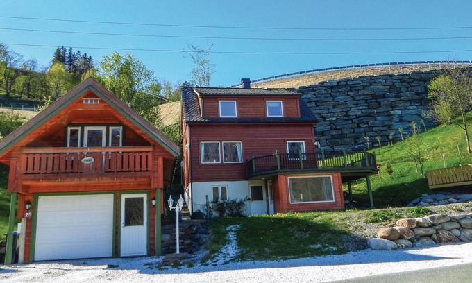 Etne Apartment | Apartment with charm, beautifully located overlooking the lake Stordalsvatnet and mighty mountains.