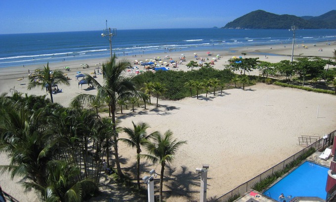 Bertioga Apartment | Apartment with garage, sea view & direct access to pool and sea