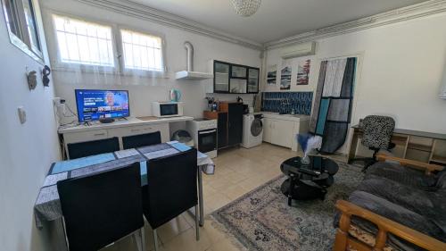 Le Fossat Apartment | Appartement avec jardin centre village avec accès PMR