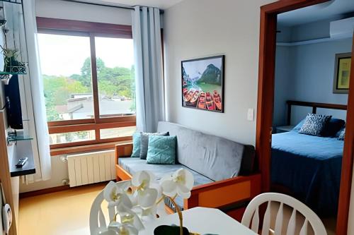 Bairro Lago Negro House | Apto Gramado a pé! Ar cond, Tv Smart, Wi-fi, Vaga!