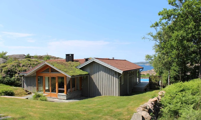 Hjaelteby Ski Chalet | Architect-designed villa with pool, sauna and sea view in Mjörn | SE09124