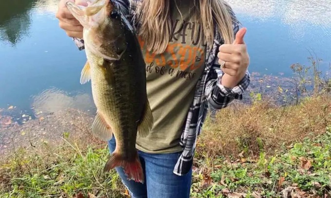 Albertville Cabin | Bass Luxury Tiny Cabin on Lake with Jump Houses