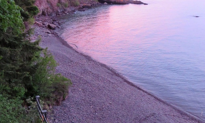 Tofte Condo | Be mesmerized by exceptional views of Lake Superior. Perched above the water!