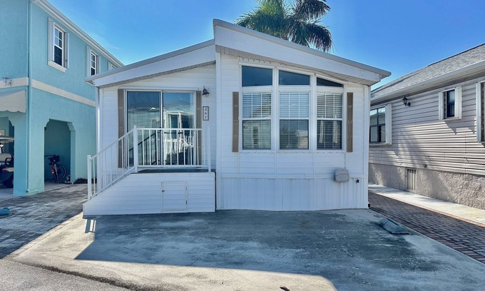 Nettles Island House | Beach Access home features an open floor plan with 2 bedrooms in a resort community