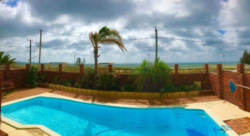 Beresford House | Beach House Opposite Ocean 4 Bed 2 Bathroom with pool