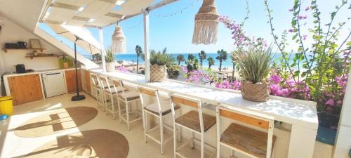 Santa Maria Apartment | Beach penthouse 12p, Fiber WiFi, 2 rooftopbars, 2 outdoor kitchens, outdoor shower, spectacular 180 degrees ocean view!