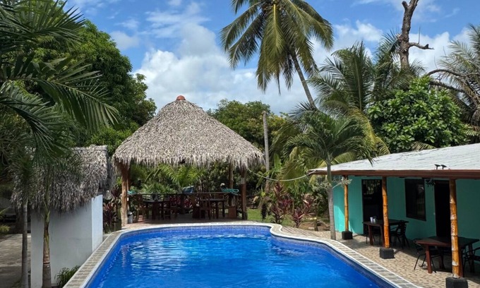 Esterillos Centro Hotel | Beachfront Escape in Esterillos Centro - Pool, A/C, WiFi & Private Rooms