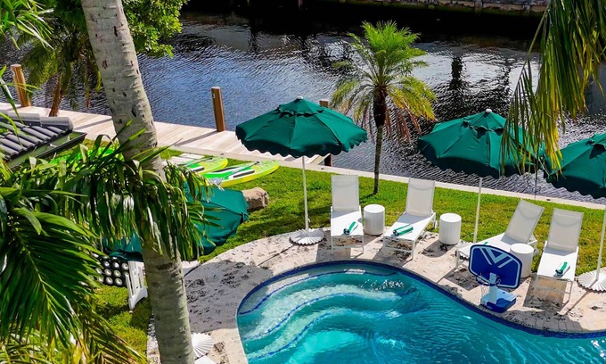 Garden Isles House | Beautiful Canalfront W/Heated Pool, Games & Sauna!