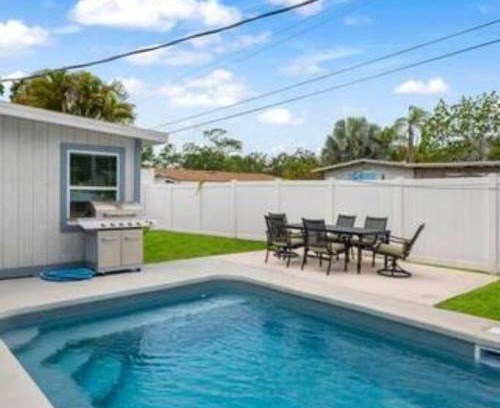 Riverview Estates House | Beautiful Home with heated pool and Fenced Yard by Siesta Key!