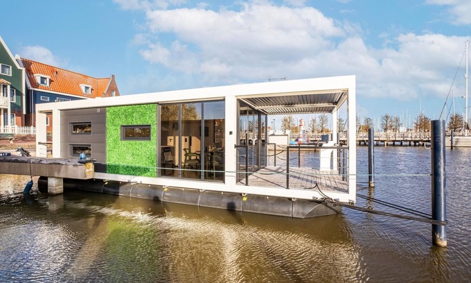 Volendam Boat Rental | Beautiful houseboat with shared pool