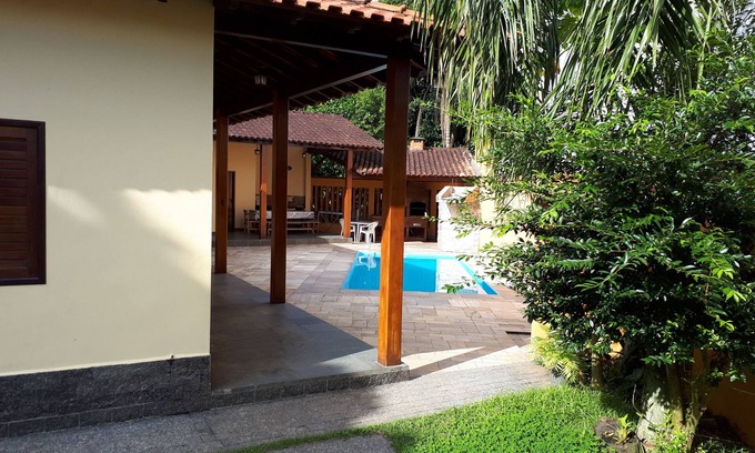 Costa do Sol House | BERTIOGA, HEATED POOL, AIR CONDITIONING, COSTA DO SOL CONDITIONING GUARATUBA BEACH