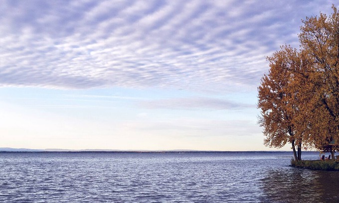 Bernhards Bay Cottage | Bliss by the Bay. Oneida Lake, stunning waterfront views, dock, cozy interior
