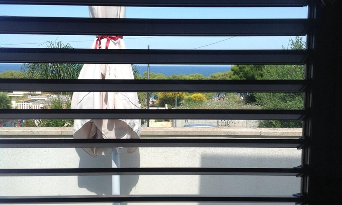 Torre dell'Orso Apartment | Blue house. Terrace facing the sea