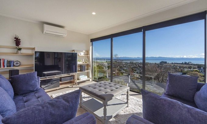 Tahunanui House | Blue Water Views - Modern, Sun-filled & Offers Fantastic Views over Tasman Bay.