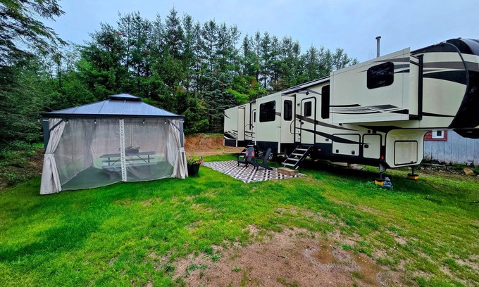 Boyne City House | Book Your Adventure in this Ultra Comfy, Luxury RV on 10 Acres. Bring your Pup!