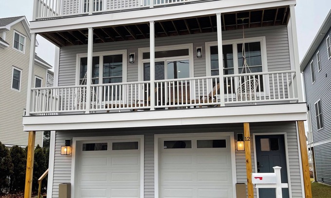 Devon House | Brand new house with water views just steps from beach!