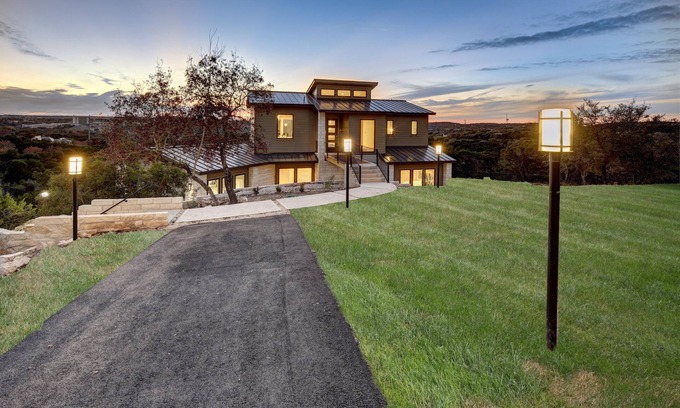Lost Creek House | Bridge to Happiness: Cross the entry bridge into a gorgeous 4 bedrooms residence
