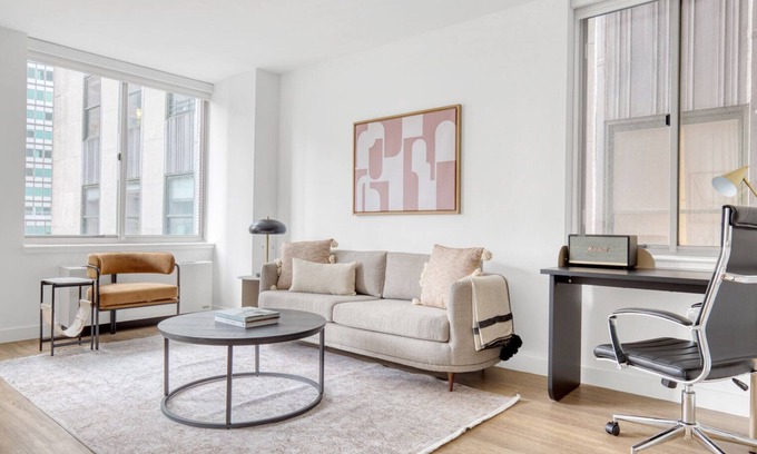 Financial District Apartment | Bright FiDi 1BR w/W/D, Doorman, Elevator & Roof Deck, by Blueground