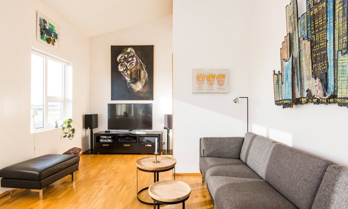 Stokkseyri Apartment | Bright & stylish flat with modern art, big balcony & hot tub. Family friendly.