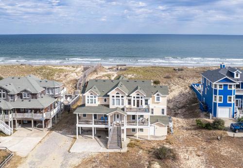 Carova Beach House | C9289 Sun King II - Oceanfront, Elevator, 4x4 Area, Pool, Hot Tub, Pets OK!