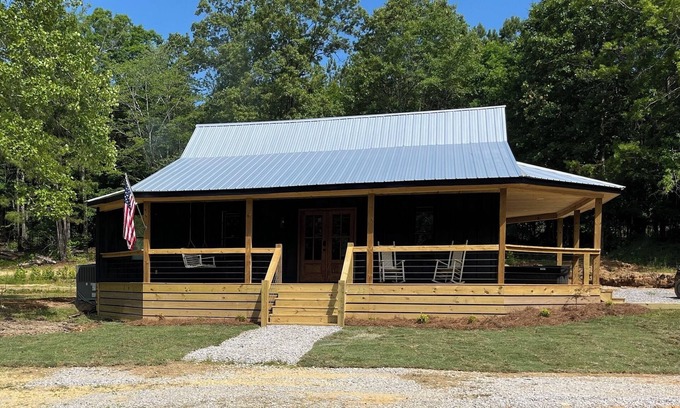 Dennis Cabin | Cabin near Bay Springs Lake! Enjoy the outdoors with convenience of WiFi.