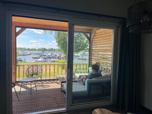 Belt-Schutsloot Apartment | Camping Kleine Belterwijde, Wiede Lodge met uitzicht over het water