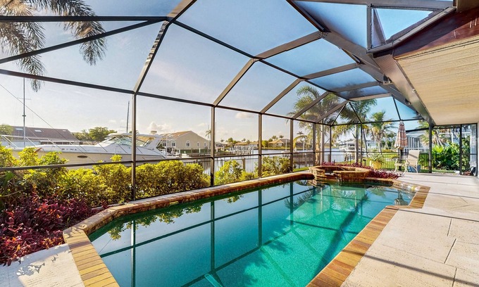 Punta Gorda House | Canal front home with private pool, lanai, and washer and dryer.