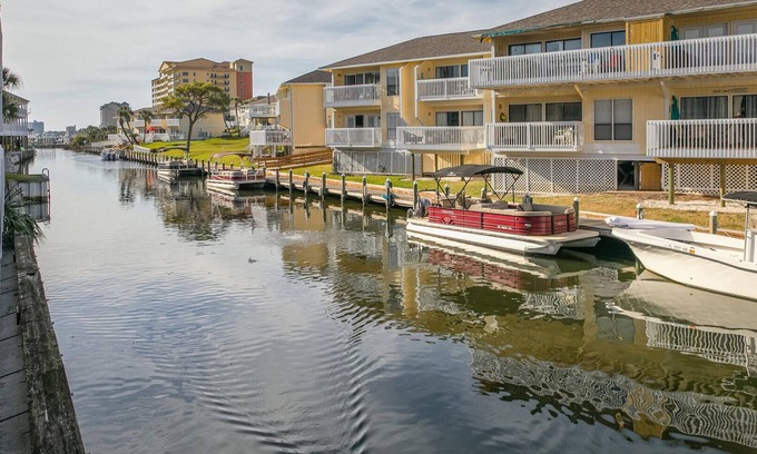 Holiday Isle Condo | Canal Views! Free Beach Service, Pet Friendly! Sandpiper Cove 4100!