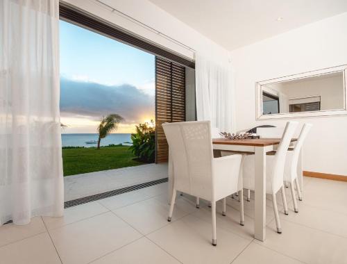 Wolmar Apartment | Cap Ouest Luxury Beachfront