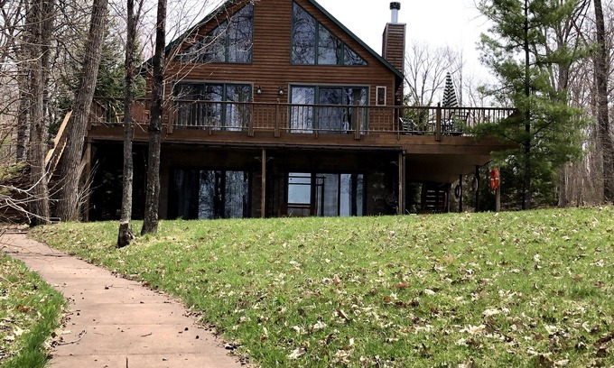Chief Lake Cabin | Captivating Views of Lake Chippewa from Three Level Chalet Cabin & Lake Home