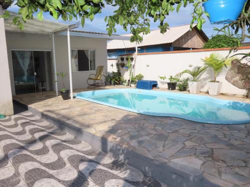 Matinhos House | Casa com piscina à 460m do Mar