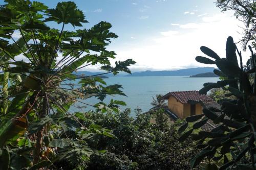 Sambaqui House | Casa em meio a natureza e em frente a praia PR7688