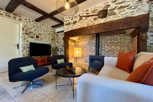 Naves House | Casa Les Combes - Maison typique climatisé avec jardin