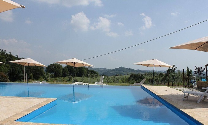 Tarano House | Casa Norberto E, fully refundable with voucher*: A graceful apartment surrounded by meadows and by green hills.
