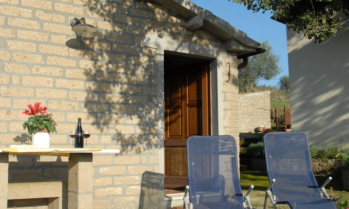 Pitigliano House | CASA RINA: Detached house with 400 M2 private fenced garden, swimming pool.