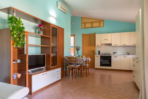 Santa Caterina House | Casa Shanti - 5 Minuti dalla Spiaggia con Piscina Condominiale