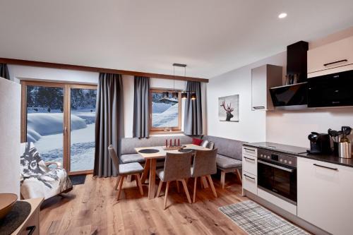 Flecken Ski Chalet | Chalet Buchensteinwand Luxusapartment mit Sauna am Berg